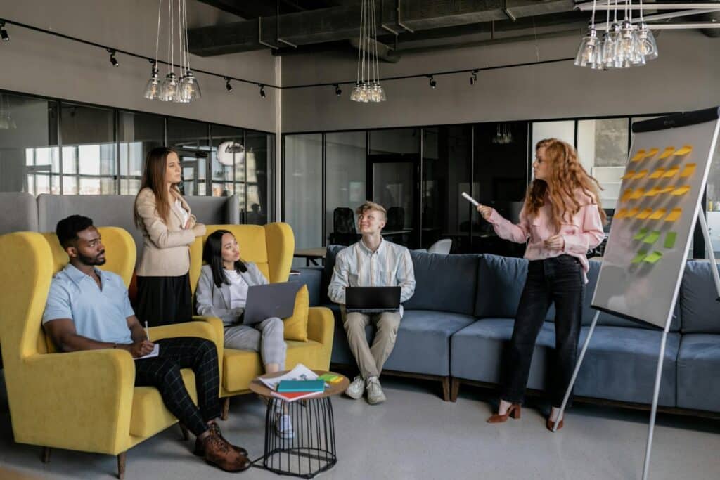 Professional team conducting a brainstorming session in a modern office setting.